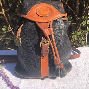 Vintage Dooney and Bourke All Weather Leather backpack . 💓